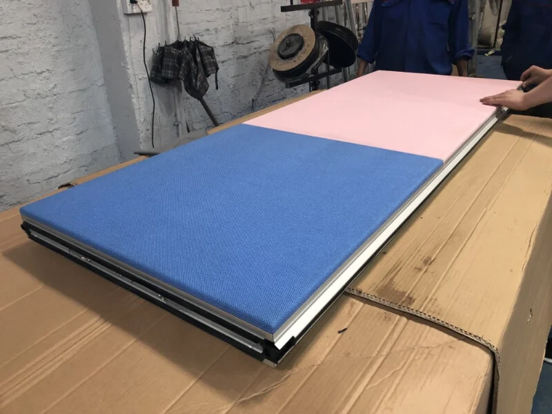 Padded fabric overlay finish on a VersaWall acoustic partition panel